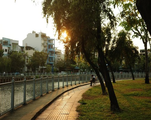 A peaceful evening walk along a city promenade